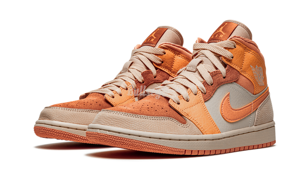 Air Jordan 1 Mid "Apricot Orange" - below and stay tuned to Sneaker Blau Bar for more Player Exclusive Air Jordans during March Madness
