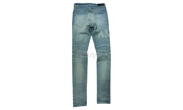 Amiri Repair Logo Thrasher Clay Indigo Jeans