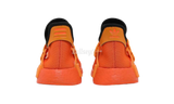 Pharrell x NMD raza humana "naranja"