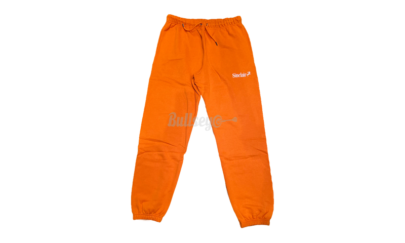 Sinclair Global Sagittarius Burnt Orange Sweatpants-Slide high-top lace-up suede sneakers with contrast leather star
