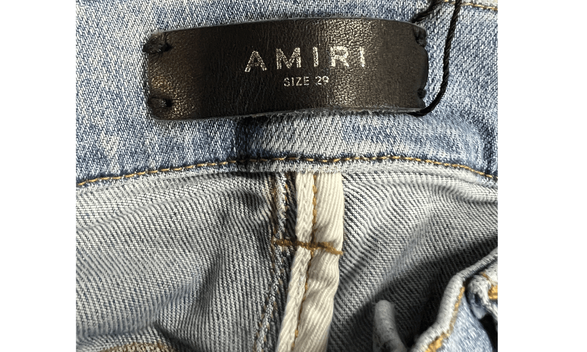 Amiri Staggered Logo Indigo Wash Jeans (PreOwned)