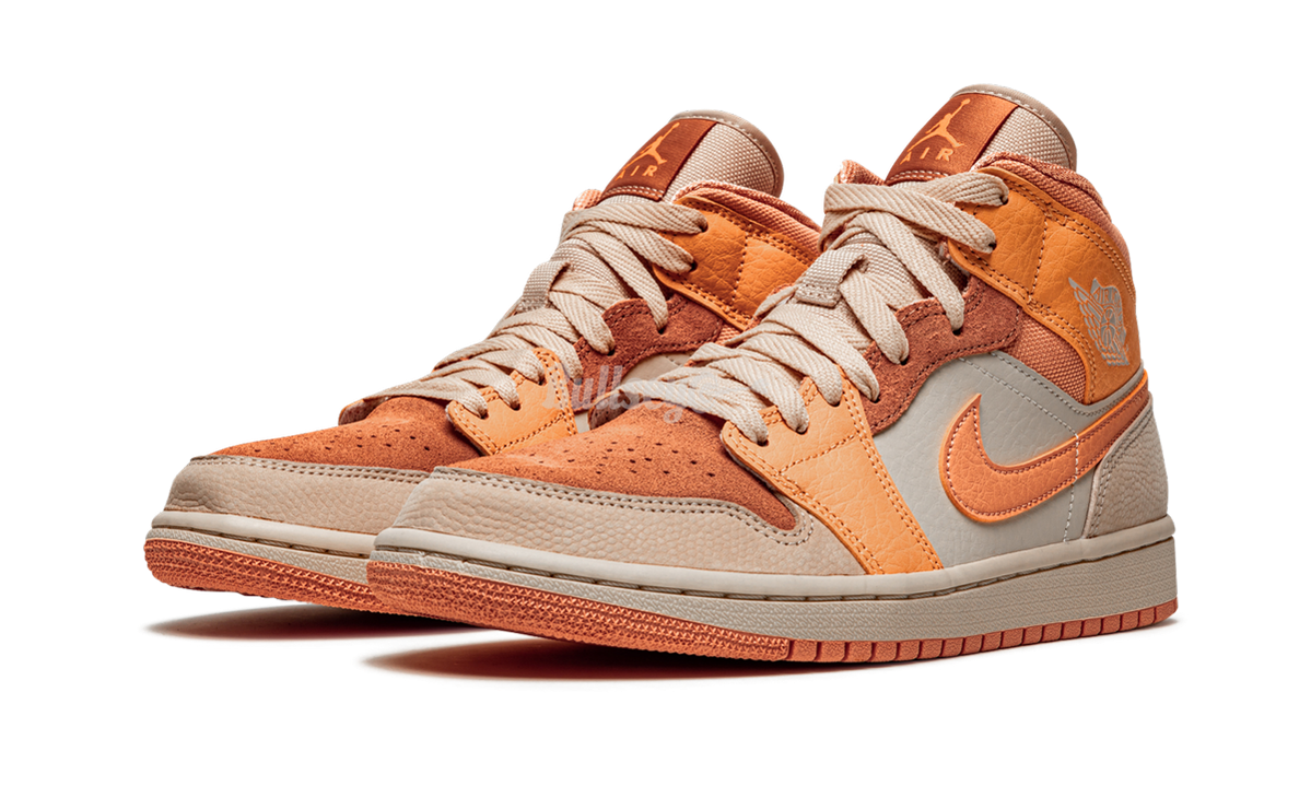 womens air jordan mid apricot orange